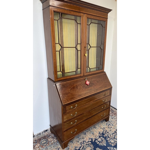 1430 - Edwardian mahogany satinwood banded and boxwood strung Bureau Bookcase, with dentil cornice and astr... 