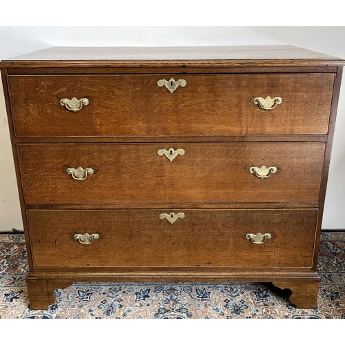 1440 - 19th century oak chest of three graduated cockbeaded drawers with brass handles on bracket feet, W10... 