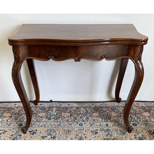 1437 - Victorian mahogany tea table, curl veneer folding serpentine top on cartouche carved cabriole legs w... 