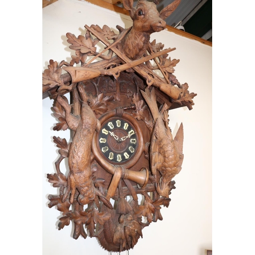 1228 - Early 20th Century Black Forest Linden wood wall clock, carved rustic cornice decorated with stag's ... 