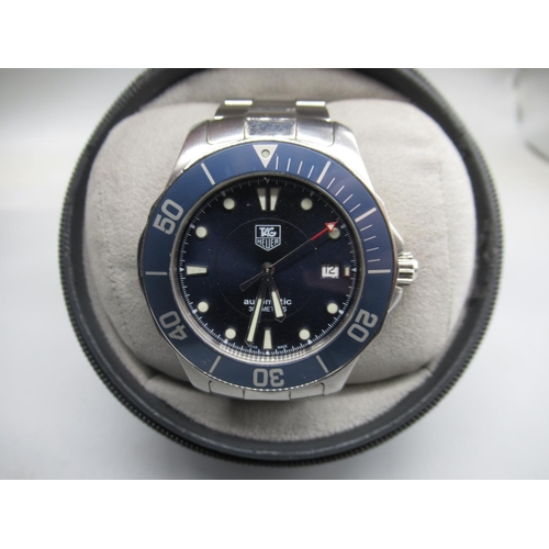 1013 - 1986 Tag Heuer Aquaracer 300M automatic wristwatch with date on matching bracelet with diver's exten... 