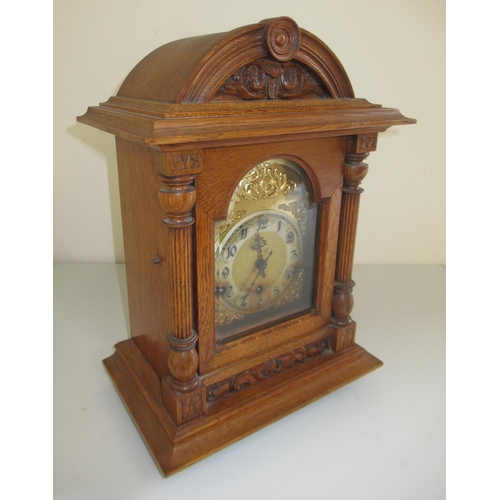 1236 - Early 20th Century German oak bracket clock, carved and moulded case with 3/4 fluted pilasters, brea... 