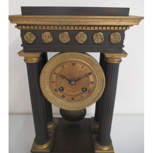 1238 - 19th Century French Empire portico clock, ebonised and gilt metal case with fluted columns on steppe... 