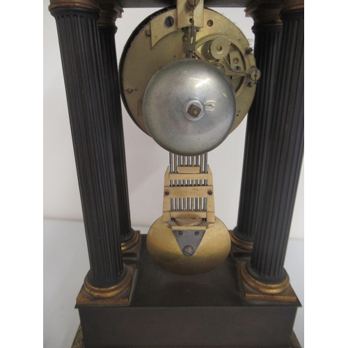 1238 - 19th Century French Empire portico clock, ebonised and gilt metal case with fluted columns on steppe... 