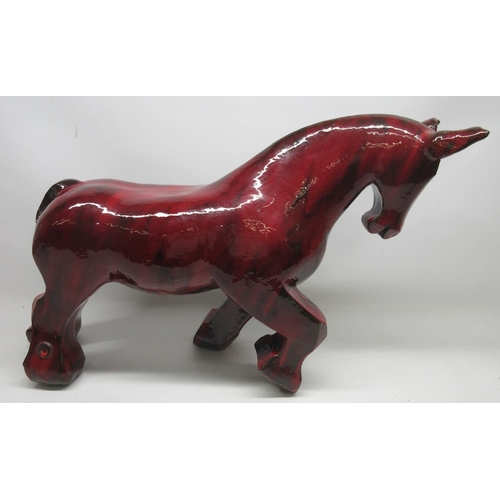 1148 - Anita Fleerackers (Belgian b.1959); 'Toro' large ceramic sculpture, in blood red glaze, W90cm H55cm