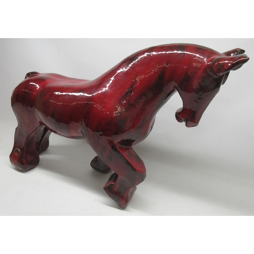 1148 - Anita Fleerackers (Belgian b.1959); 'Toro' large ceramic sculpture, in blood red glaze, W90cm H55cm