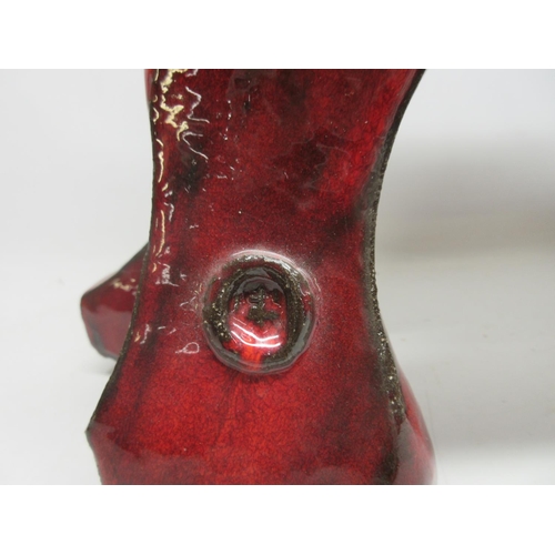 1148 - Anita Fleerackers (Belgian b.1959); 'Toro' large ceramic sculpture, in blood red glaze, W90cm H55cm