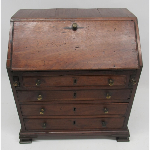 1092 - 20th century George 111 style mahogany miniature bureau fall front above four drawers on ogee bracke... 