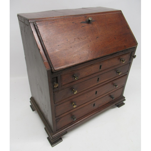 1092 - 20th century George 111 style mahogany miniature bureau fall front above four drawers on ogee bracke... 