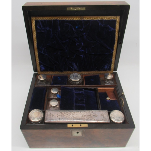 1102 - Victorian rosewood vanity case, the hinged lid with rectangular mother of pearl panel, fitted interi... 