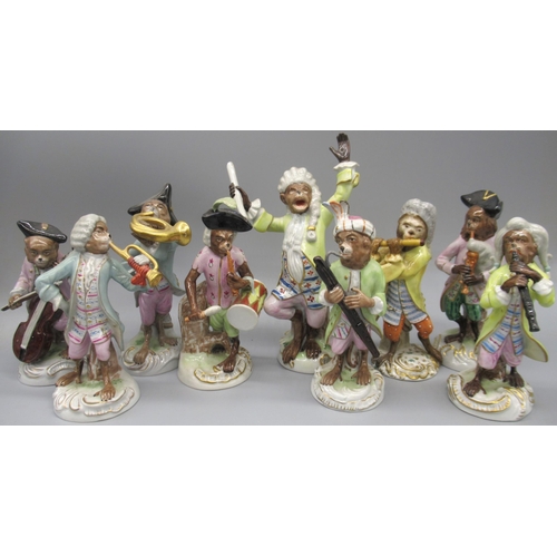 1173 - Set of eight Sitzendorf Monkey bandsmen, each playing a different instrument, with conductor, all en... 