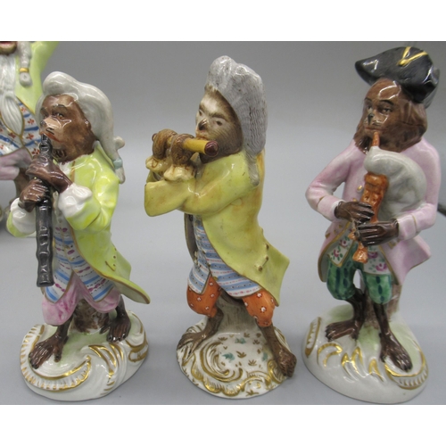 1173 - Set of eight Sitzendorf Monkey bandsmen, each playing a different instrument, with conductor, all en... 