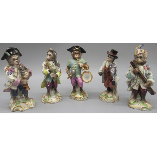 1174 - Set of five Naples porcelain Monkey bandsmen, enamelled in colours, on shaped bases with gilt detail... 