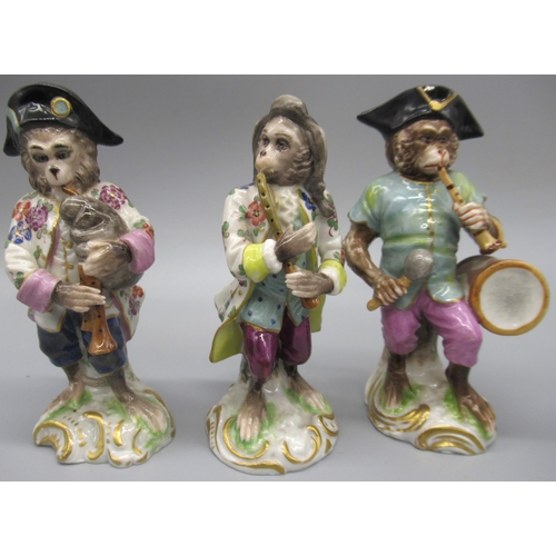 1174 - Set of five Naples porcelain Monkey bandsmen, enamelled in colours, on shaped bases with gilt detail... 