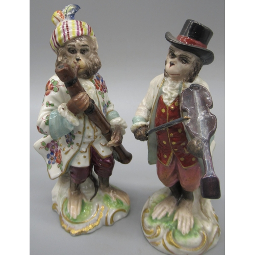 1174 - Set of five Naples porcelain Monkey bandsmen, enamelled in colours, on shaped bases with gilt detail... 