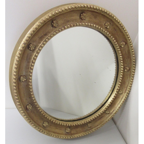 1453 - Regency style gilt wall mirror, circular plate in beaded and floral frame, D44cm