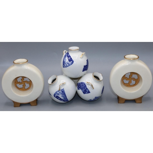 1217 - Royal Worcester Aesthetic Period triple globular vase, decorated in blue and white with Oriental mot... 