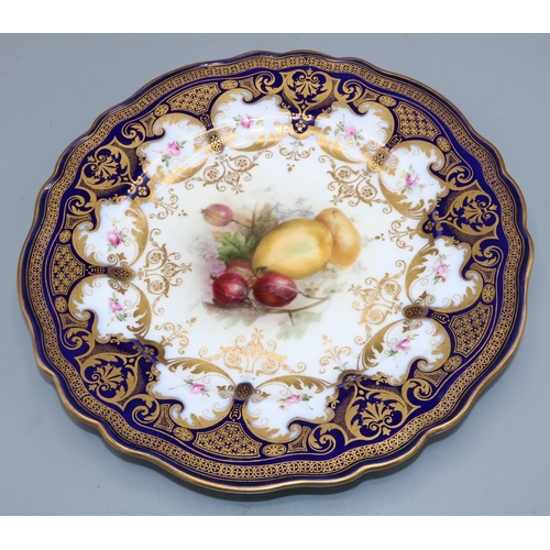 1188 - Royal Worcester cabinet plate painted to centre with fruit by Richard Sebright, within a blue and gi... 