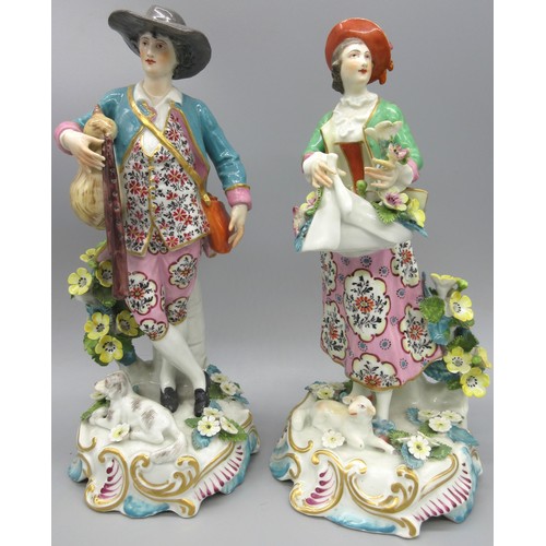 1175 - Pair of Continental figures, modelled as a Gamekeeper and his Lass, decorated in Chelsea style palet... 