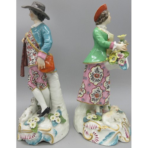 1175 - Pair of Continental figures, modelled as a Gamekeeper and his Lass, decorated in Chelsea style palet... 