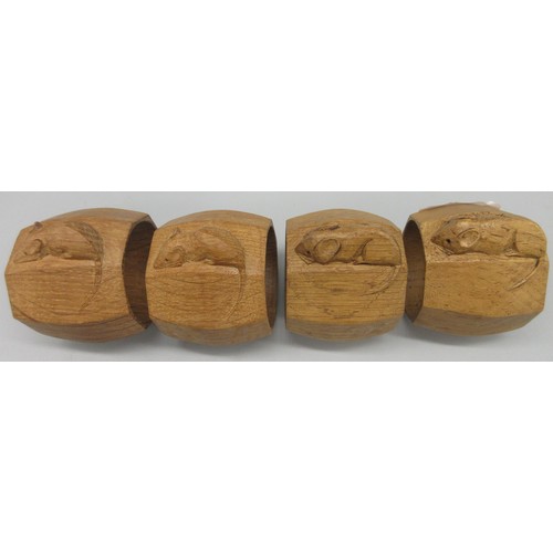 1382 - Robert Mouseman Thompson of Kilburn - a set of four octagonal napkin rings, carved with signature mo... 