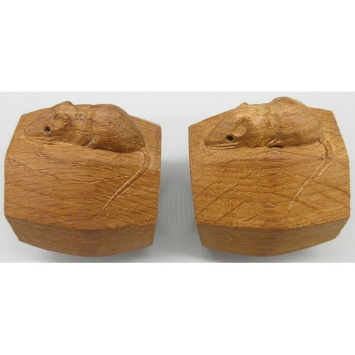 1397 - Robert Mouseman Thompson of Kilburn - a pair of octagonal napkin rings, carved with signature mouse ... 