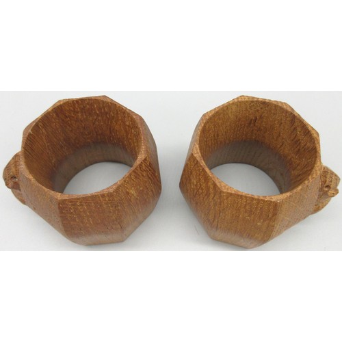 1397 - Robert Mouseman Thompson of Kilburn - a pair of octagonal napkin rings, carved with signature mouse ... 