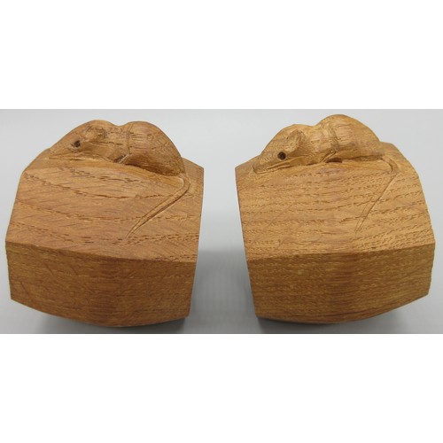 1397 - Robert Mouseman Thompson of Kilburn - a pair of octagonal napkin rings, carved with signature mouse ... 