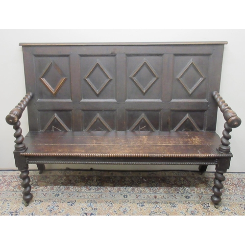 1423 - 20th century oak settle, lozenge panel back and solid seat with barley twist arms and legs, W146cm D... 