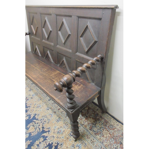 1423 - 20th century oak settle, lozenge panel back and solid seat with barley twist arms and legs, W146cm D... 