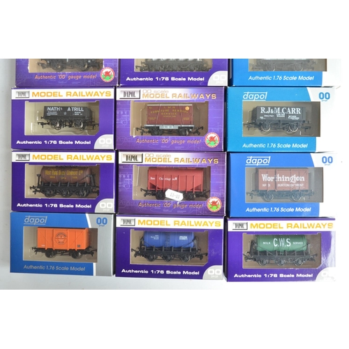 1138 - Collection of sixteen boxed OO gauge goods wagons from Dapol and a Dapol B800 track cleaner, models ... 