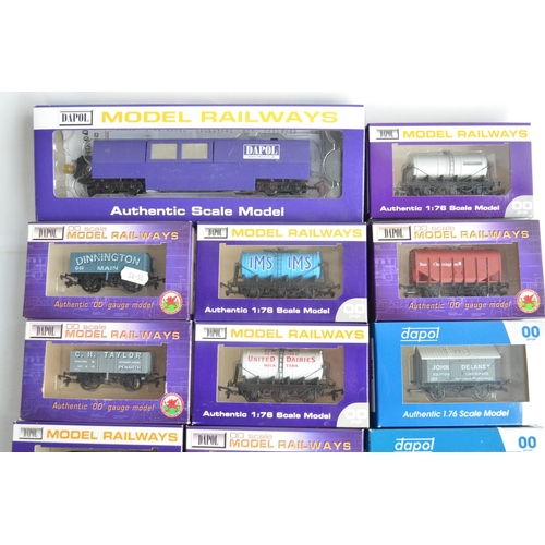 1138 - Collection of sixteen boxed OO gauge goods wagons from Dapol and a Dapol B800 track cleaner, models ... 