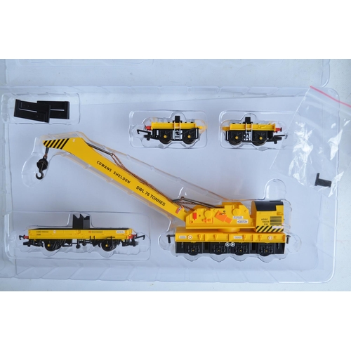 1143 - Collection of boxed OO gauge goods and service wagons from Hornby to include R6897 75 ton operating ... 