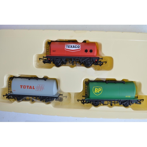 1143 - Collection of boxed OO gauge goods and service wagons from Hornby to include R6897 75 ton operating ... 