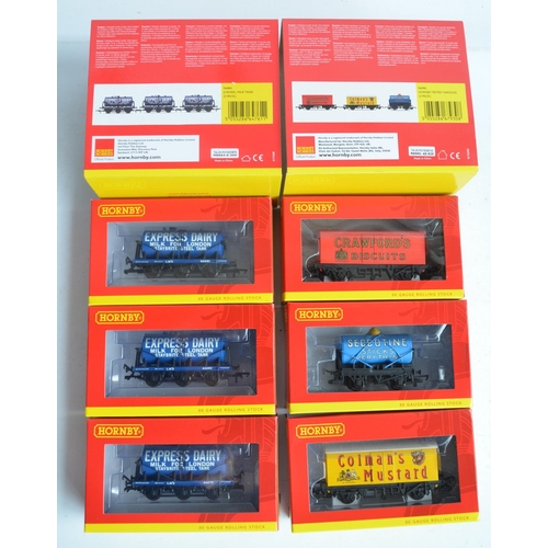 1143 - Collection of boxed OO gauge goods and service wagons from Hornby to include R6897 75 ton operating ... 