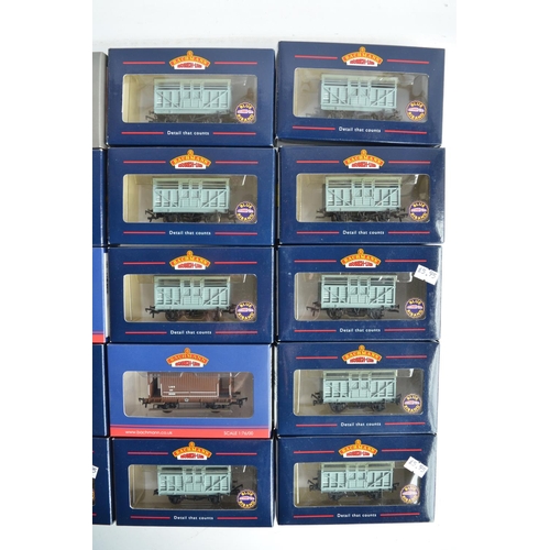 1144 - Twenty boxed OO gauge LMS rolling stock models from Bachmann and Dapol to include cattle wagons and ... 