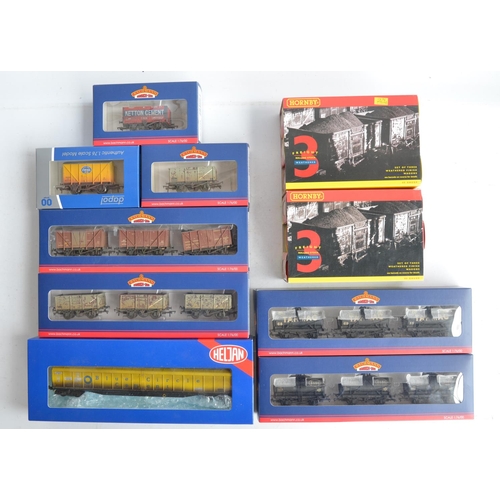 1146 - Collection of boxed OO gauge weathered rolling stock models from Bachmann, Hornby, Dapol and Heljan ... 