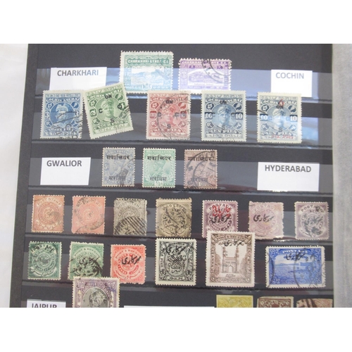 819 - Two albums cont. c19th/c20th India & States, South Africa, Transvaal, etc. stamps