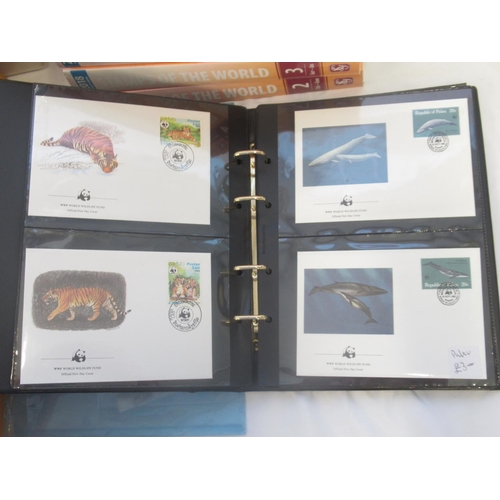 821 - Large collection of Stamps and FDCs in boxes and 6 volumes of Stanley Gibbons 2018 Stamps of the Wor... 