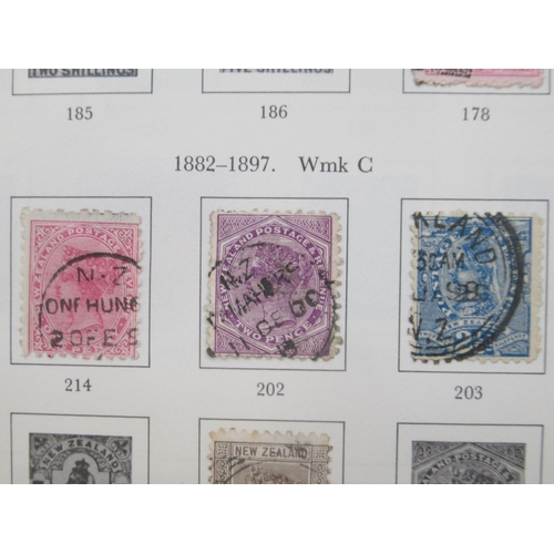 824 - Stanley Gibbons Great Britain and a New Zealand stamp album cont. c19th/20th stamps, both partially ... 