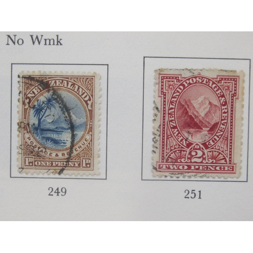 824 - Stanley Gibbons Great Britain and a New Zealand stamp album cont. c19th/20th stamps, both partially ... 