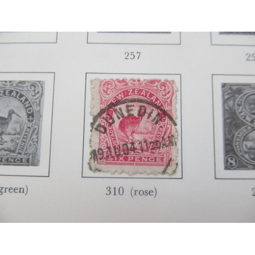 824 - Stanley Gibbons Great Britain and a New Zealand stamp album cont. c19th/20th stamps, both partially ... 