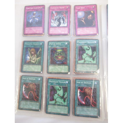 1454 - Collection of Yu-Gi-Oh! trading cards loose and in a folder (approx. 490)