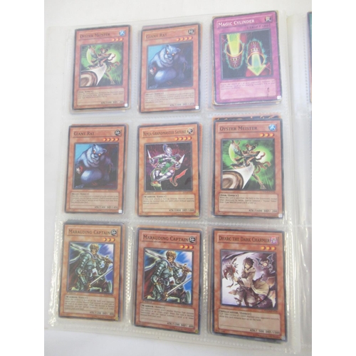 1454 - Collection of Yu-Gi-Oh! trading cards loose and in a folder (approx. 490)