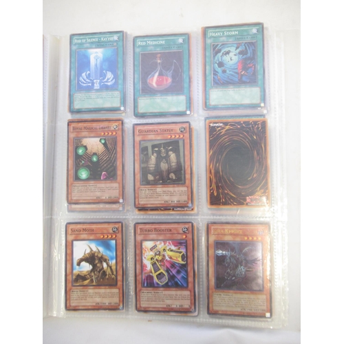 1454 - Collection of Yu-Gi-Oh! trading cards loose and in a folder (approx. 490)