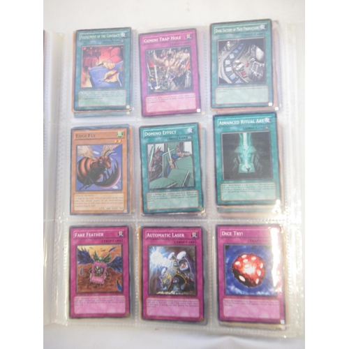 1454 - Collection of Yu-Gi-Oh! trading cards loose and in a folder (approx. 490)