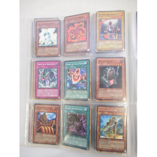 1454 - Collection of Yu-Gi-Oh! trading cards loose and in a folder (approx. 490)