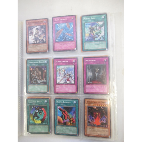 1454 - Collection of Yu-Gi-Oh! trading cards loose and in a folder (approx. 490)