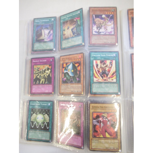 1454 - Collection of Yu-Gi-Oh! trading cards loose and in a folder (approx. 490)