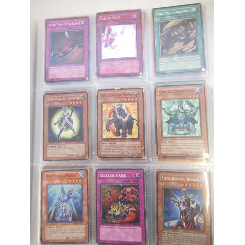 1454 - Collection of Yu-Gi-Oh! trading cards loose and in a folder (approx. 490)